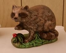 small raccoon figure (CC)